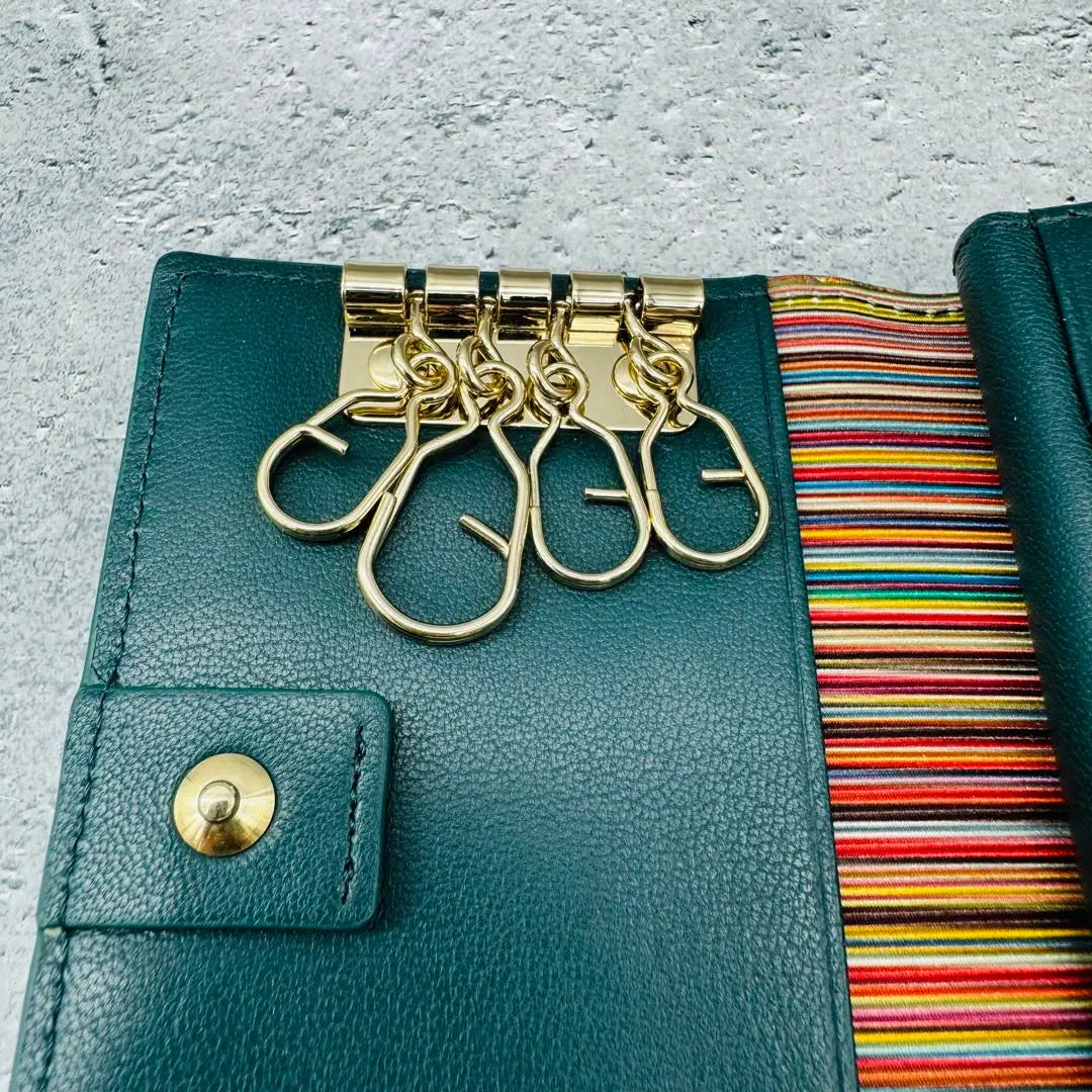 [Nuevo/sin usar] Estuche para llaves Paul Smith con 4 rayas en verde azulado