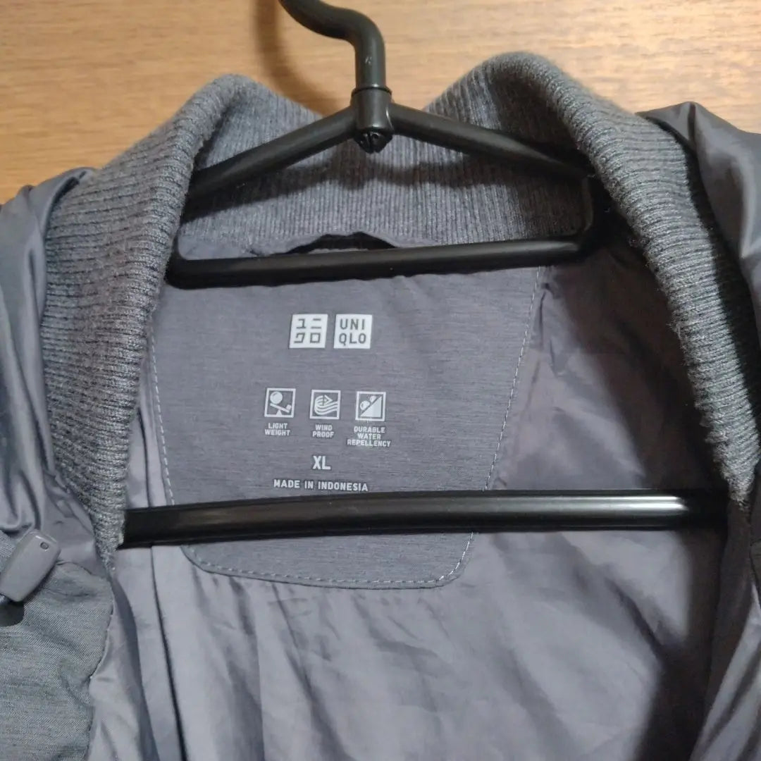 Chaqueta de plumas gris UNIQLO XL