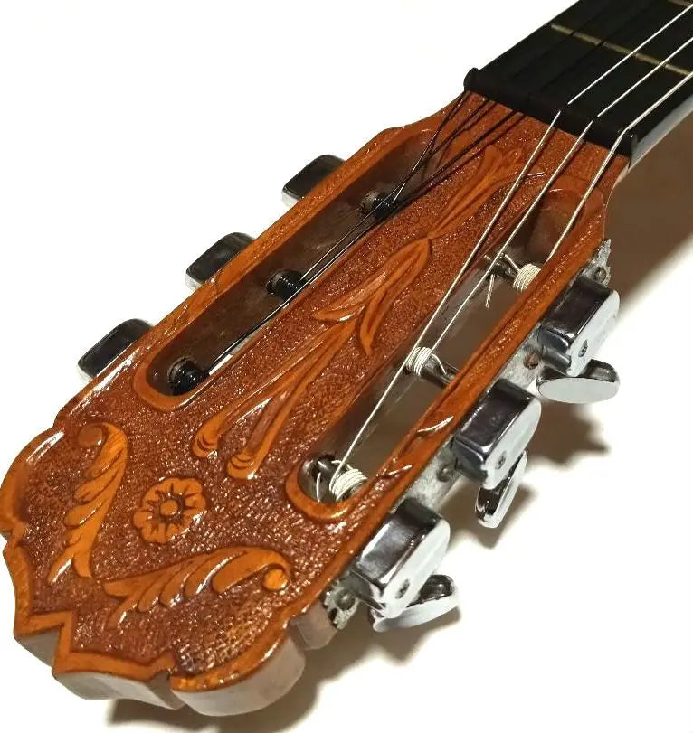 Escultura de cabeza de silla de montar de hueso de res cuerdas nueva guitarra clásica