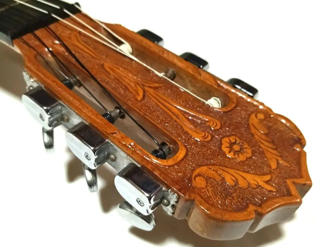 Escultura de cabeza de silla de montar de hueso de res cuerdas nueva guitarra clásica