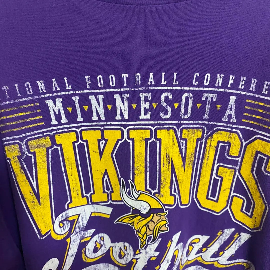 [B59] Camiseta con estampado de logotipo grande del equipo Minnesota Vikings de la NFL