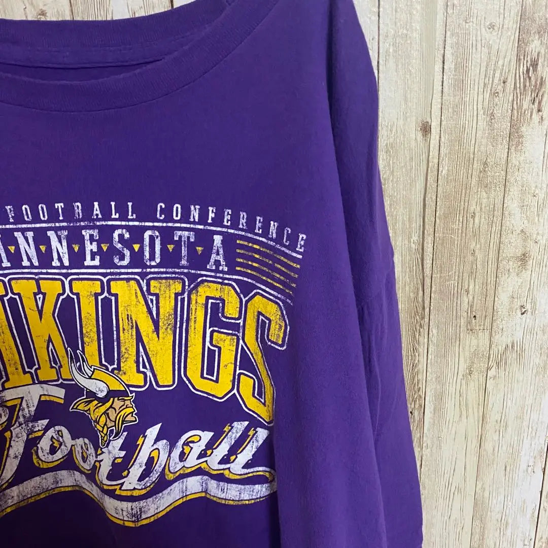 [B59] Camiseta con estampado de logotipo grande del equipo Minnesota Vikings de la NFL