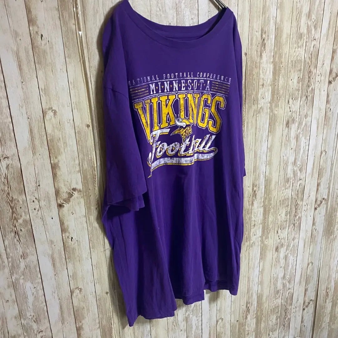 [B59] Camiseta con estampado de logotipo grande del equipo Minnesota Vikings de la NFL