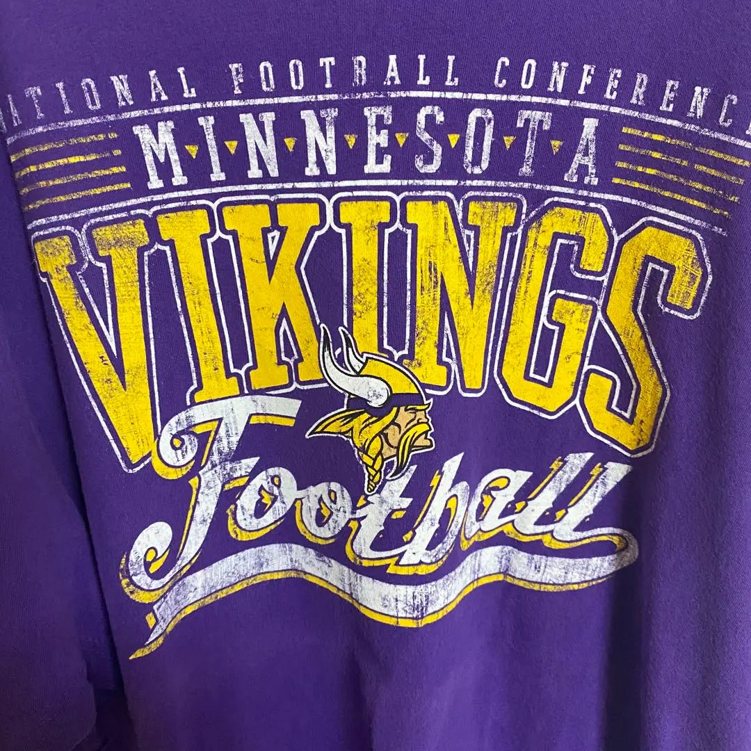 [B59] Camiseta con estampado de logotipo grande del equipo Minnesota Vikings de la NFL