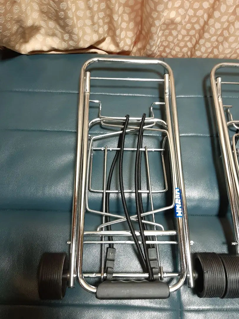 Two folding carry carts (one string has a problem)