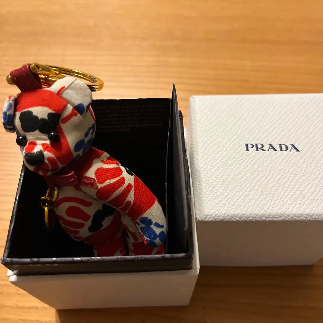 Brand new, unused PRADA bear-shaped keychain, floral pattern