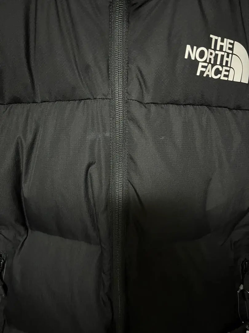 *The North Face con un defecto: RMST NUPTSE JACKET BLACK M