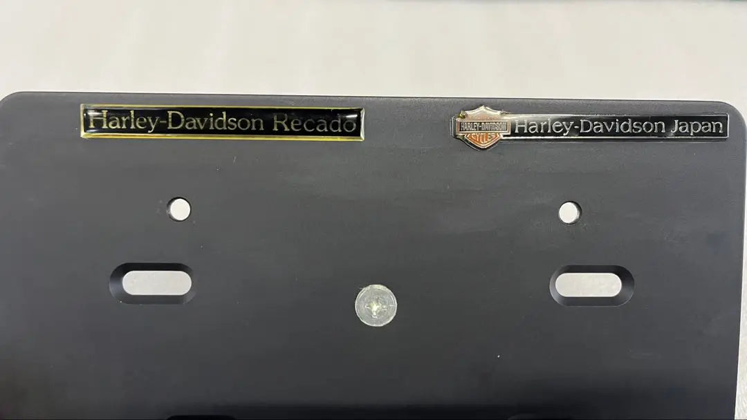 Placa de soporte de matrícula original de Harley Dyna