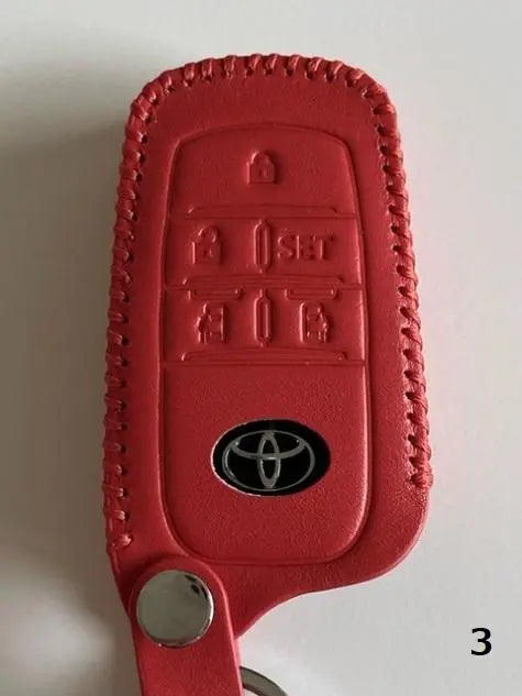 The current Sienta smart key case 5B orange 3