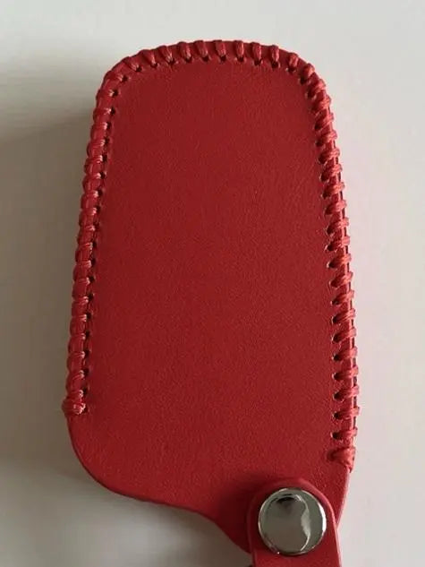 The current Sienta smart key case 5B orange 3