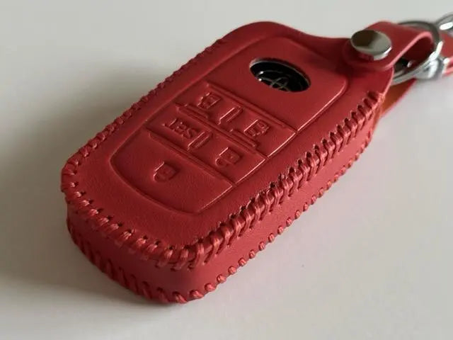 The current Sienta smart key case 5B orange 3