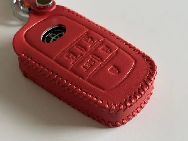 The current Sienta smart key case 5B orange 3