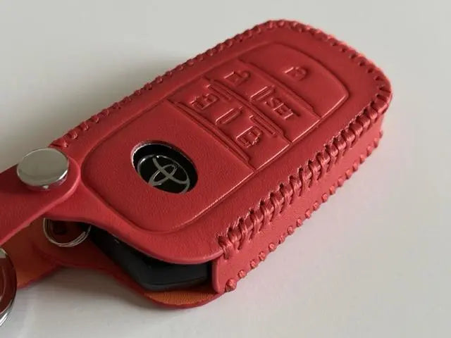 The current Sienta smart key case 5B orange 3