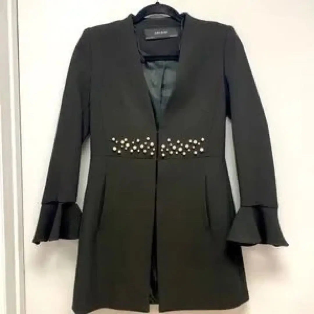 Chaqueta de traje con abrigo de ZARA