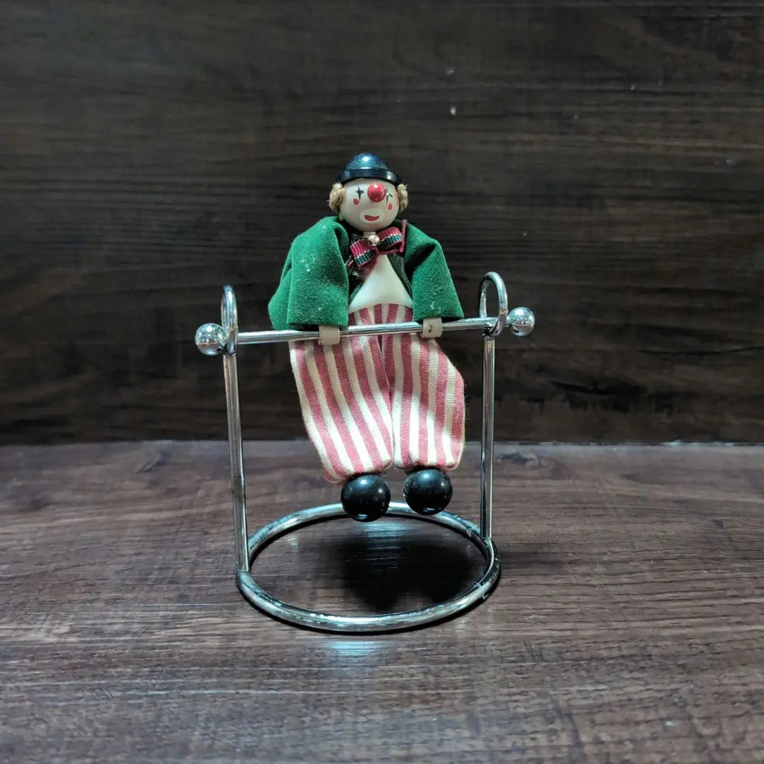 Clown pendulum figurine