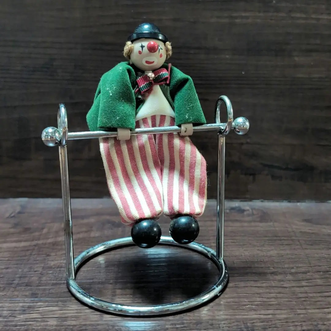 Clown pendulum figurine