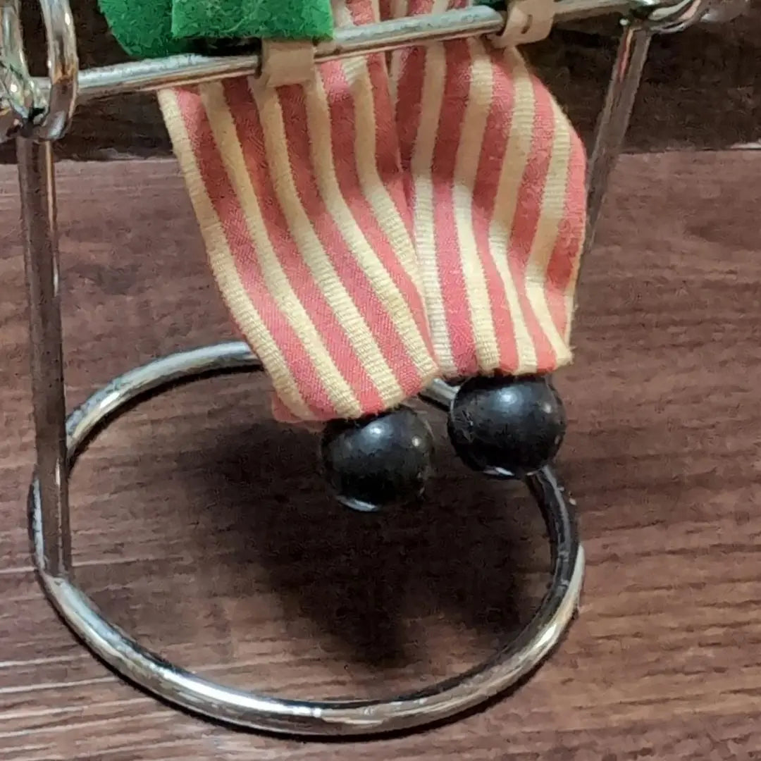 Clown pendulum figurine