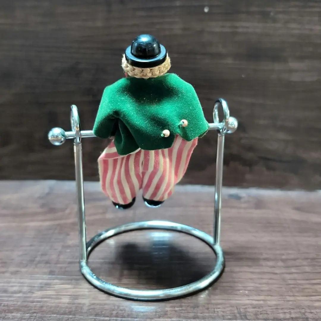 Clown pendulum figurine