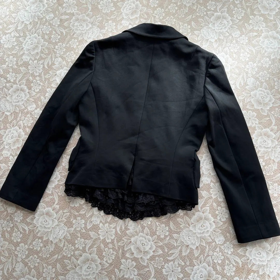 Hermosa chaqueta a medida con volantes y encaje de diamantes de Jesús, talla 38, color negro