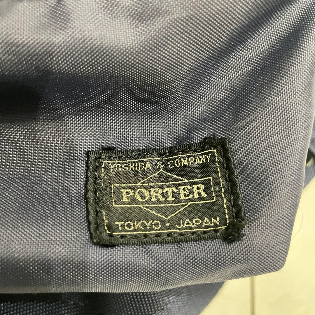 Bolsa para cadáveres Porter azul marino en el interior | ポーター ネイビー ボディバッグ オレンジ内側