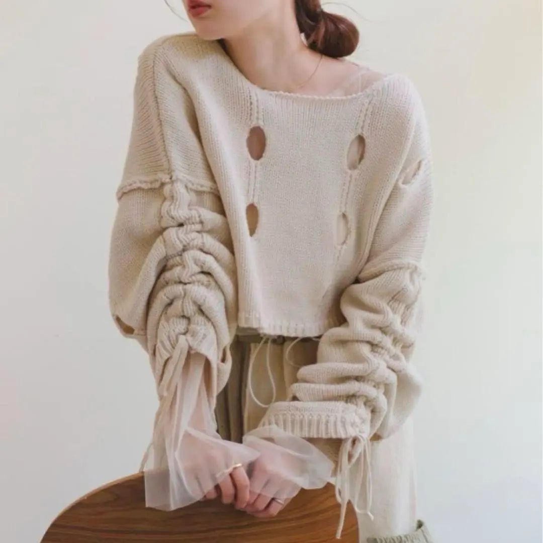 Perforated design cream color knit sweater