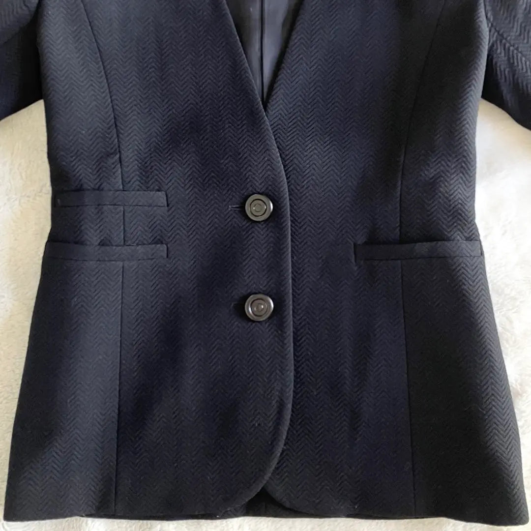 Conjunto de chaqueta y falda de lana de Christian Dior en color negro talla L