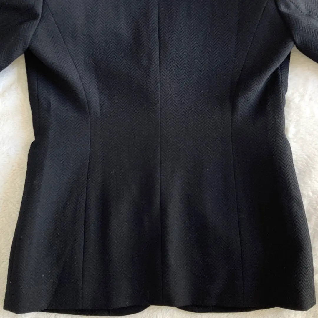 Conjunto de chaqueta y falda de lana de Christian Dior en color negro talla L