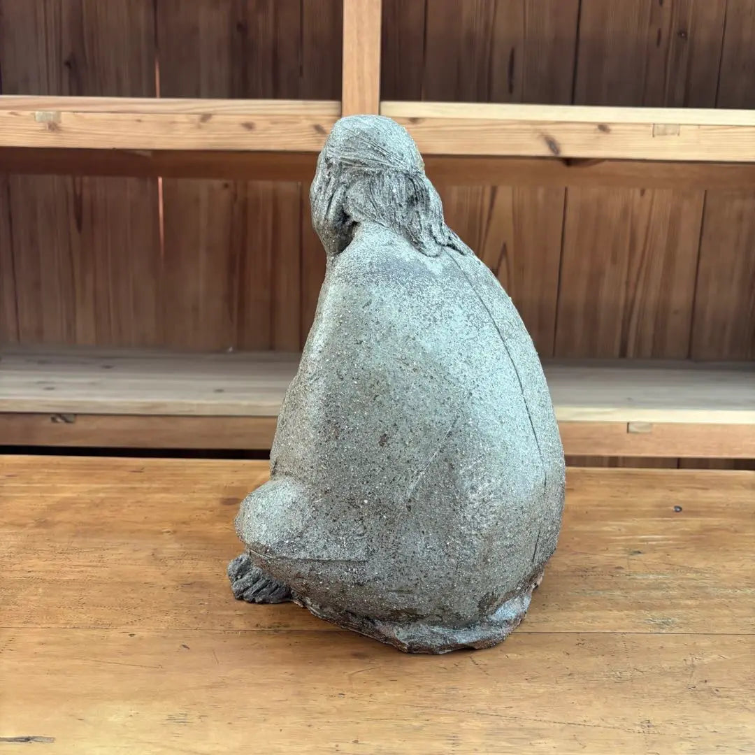 Ceramic sculpture: A vaguely thoughtful figure, ornament, object