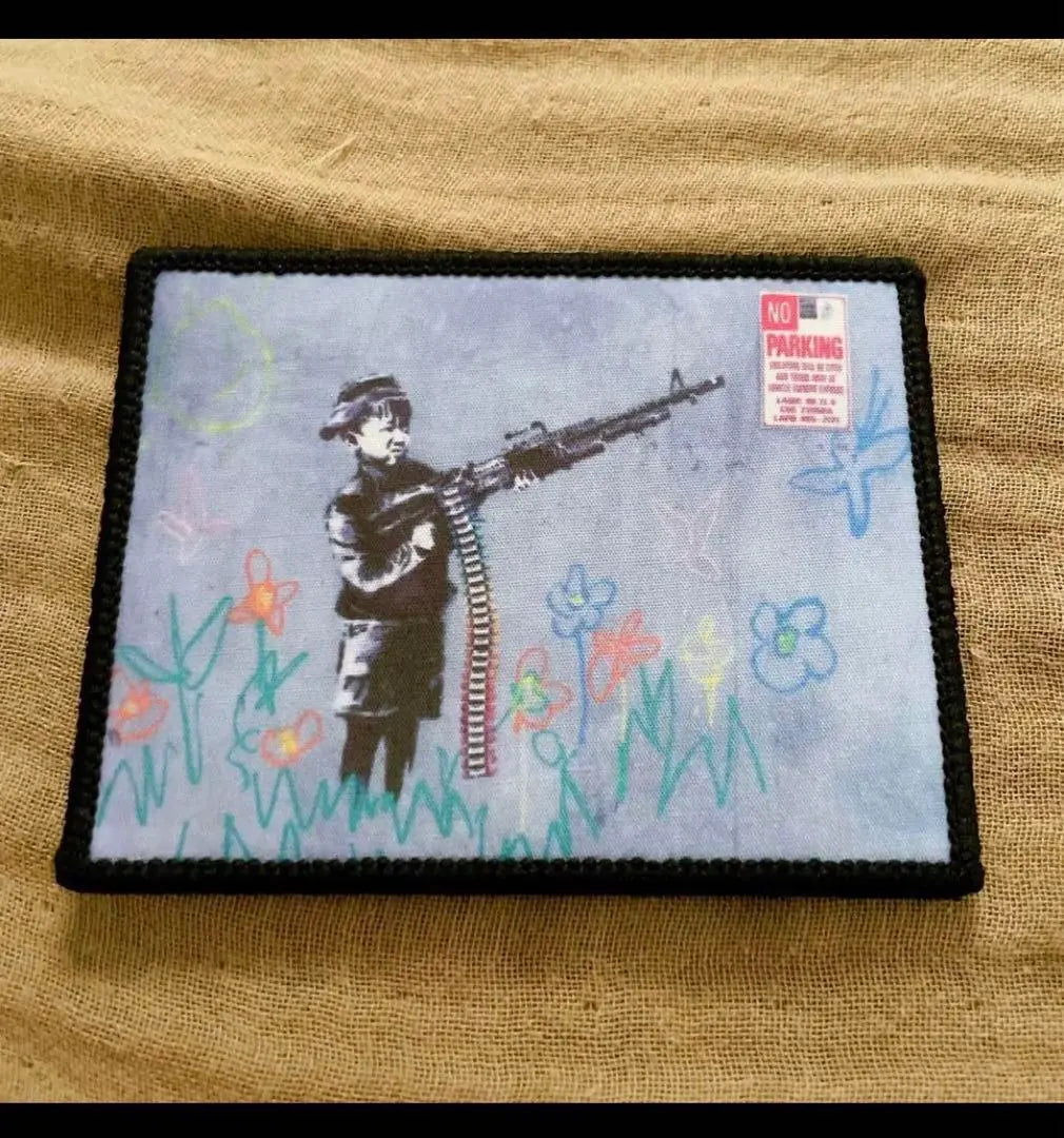 Juego de airsoft con transferencia cruzada de graffiti de Banksy Dongri