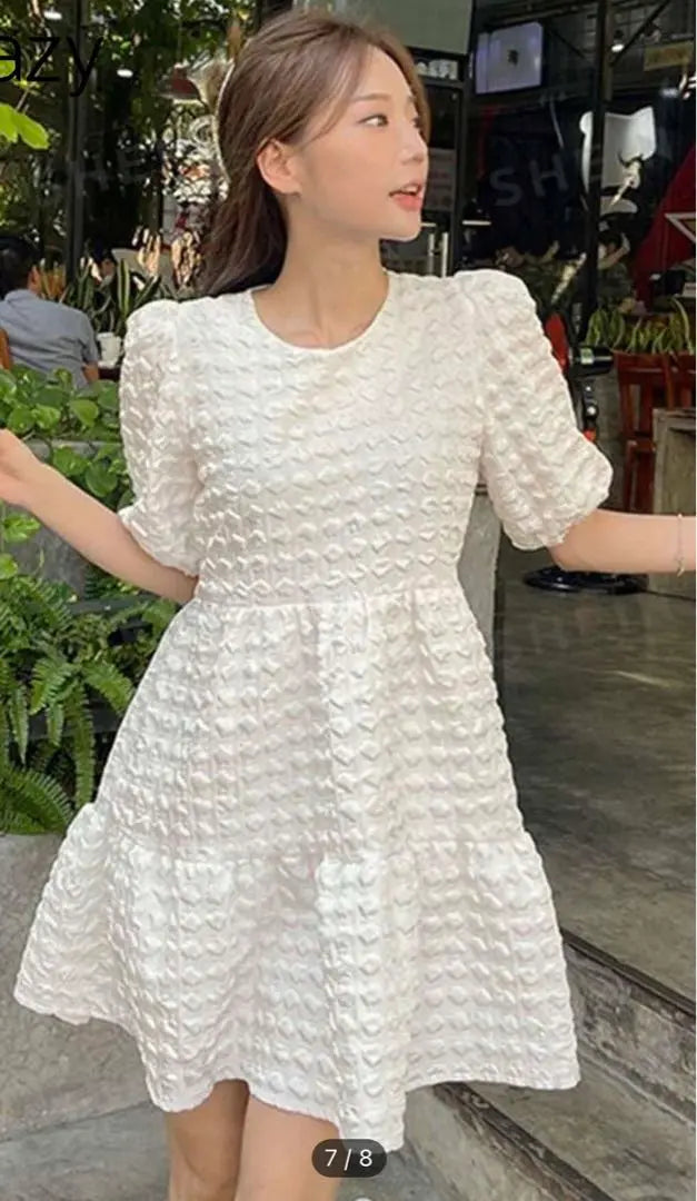 Vestido con mangas abullonadas