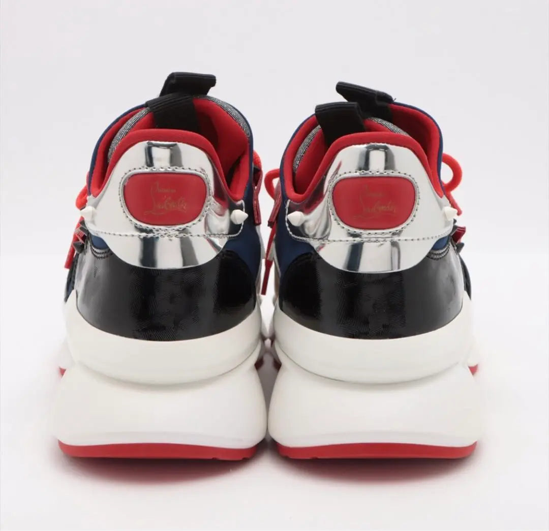 Brand new, unused, out of print, Christian Louboutin sneakers, red runner