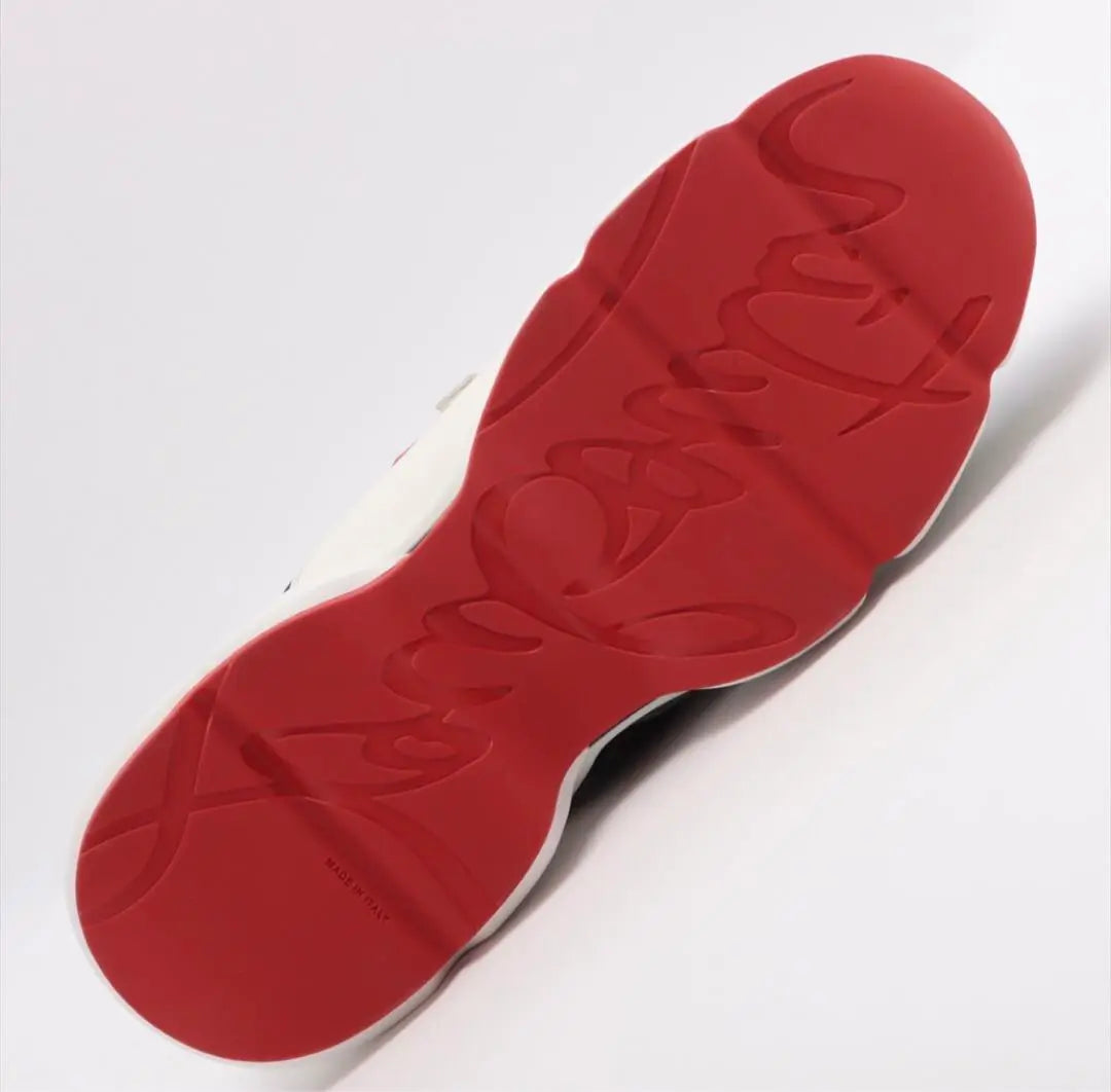 Brand new, unused, out of print, Christian Louboutin sneakers, red runner