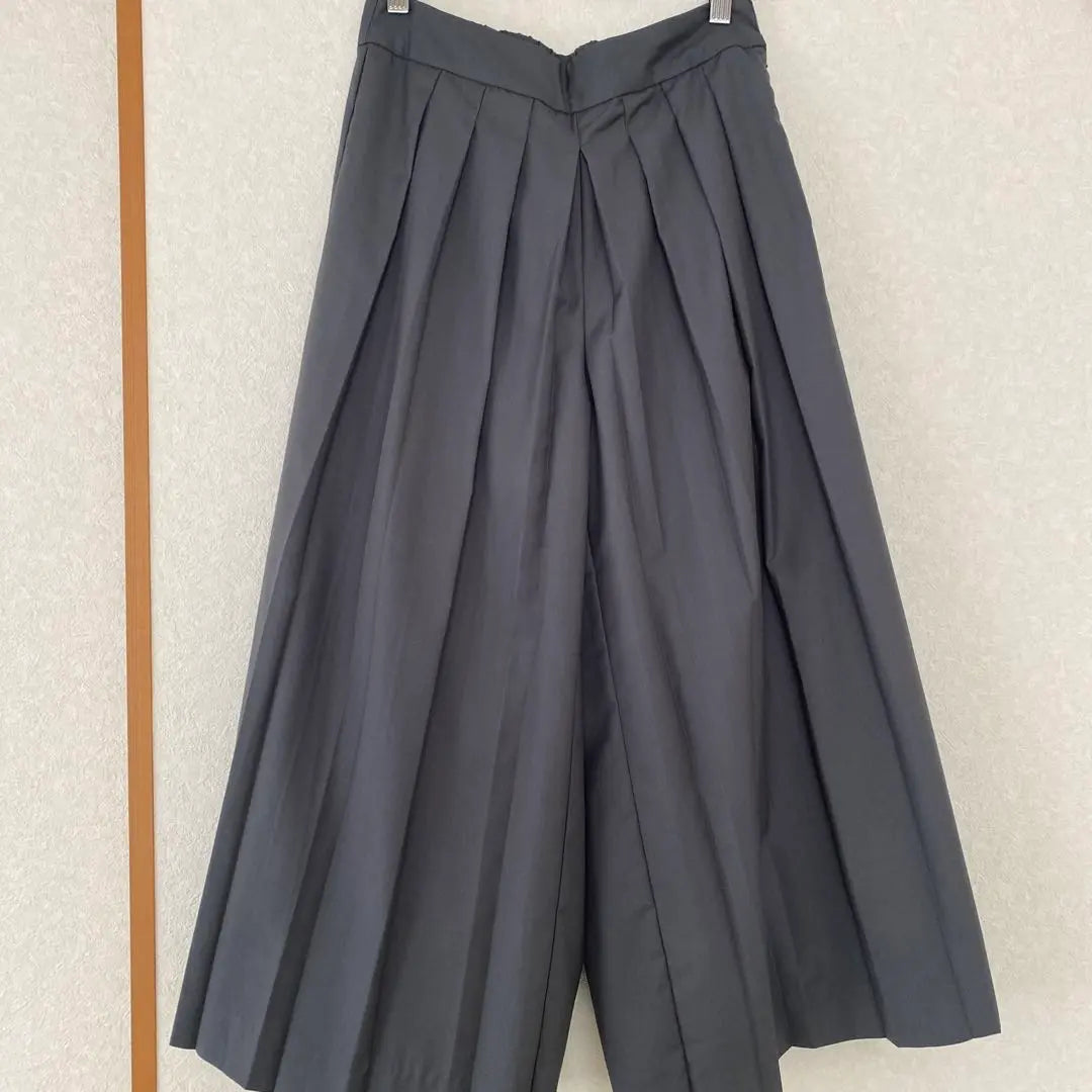 Grey pleated gaucho pants