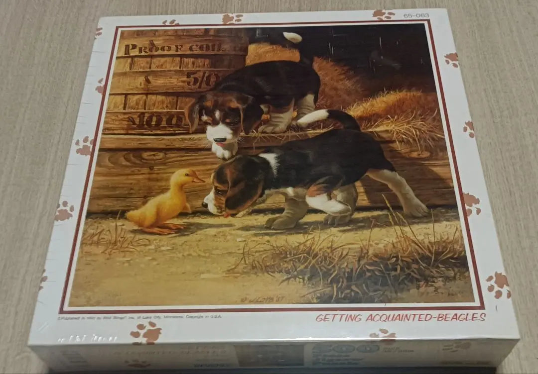 A 500-piece jigsaw puzzle with a beagle and duckling and a two-piece set