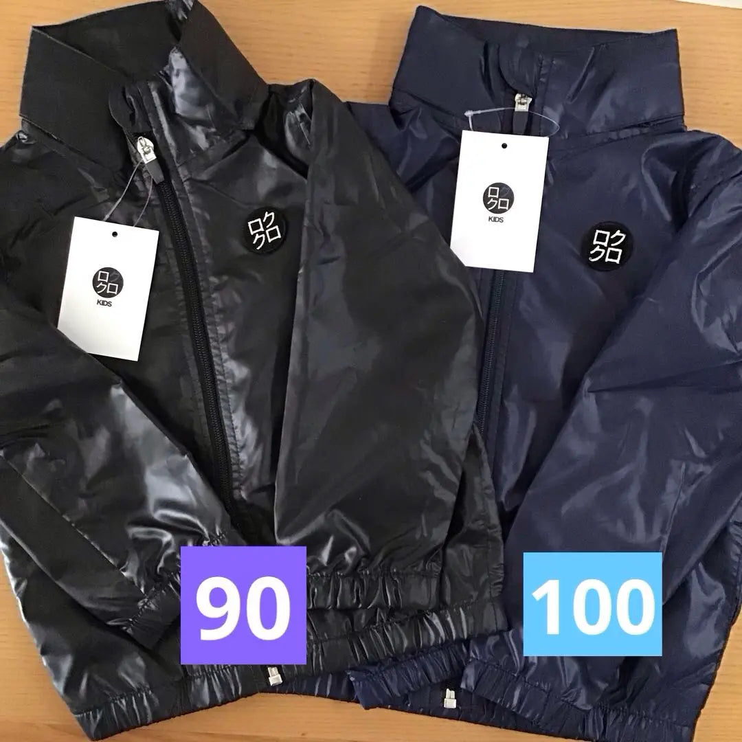 Rokuroku Tag Black 90 Navy 100 Windbreaker Folded and stored