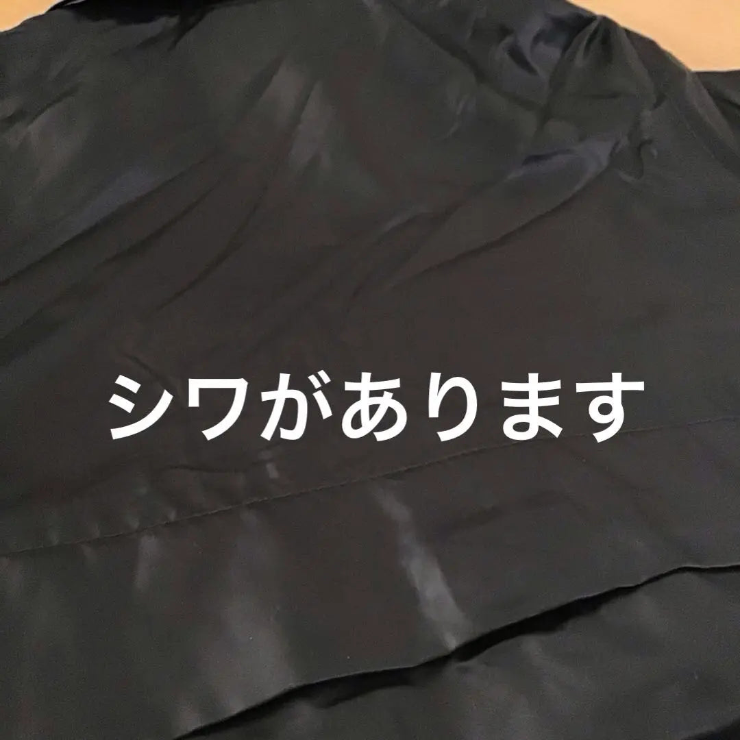 Rokuroku Tag Black 90 Navy 100 Windbreaker Folded and stored