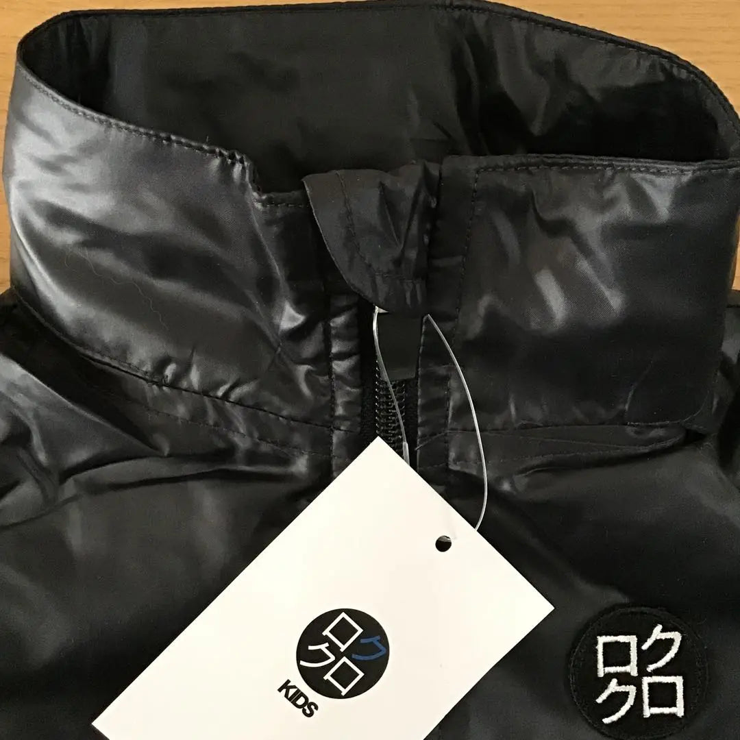 Rokuroku Tag Black 90 Navy 100 Windbreaker Folded and stored