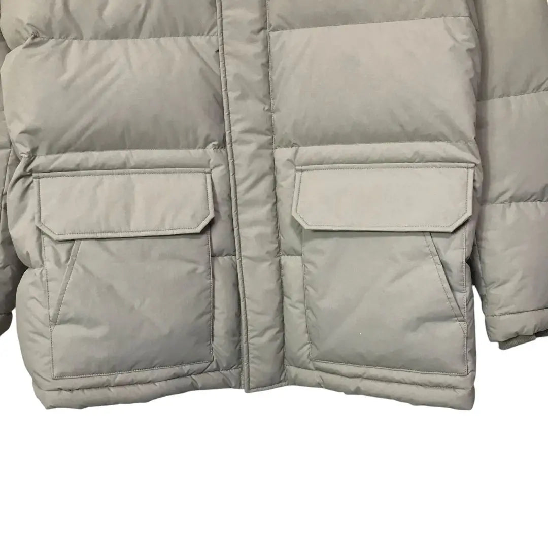 With tag new unused UNIQLO Nylon Down jacket with hood ivory