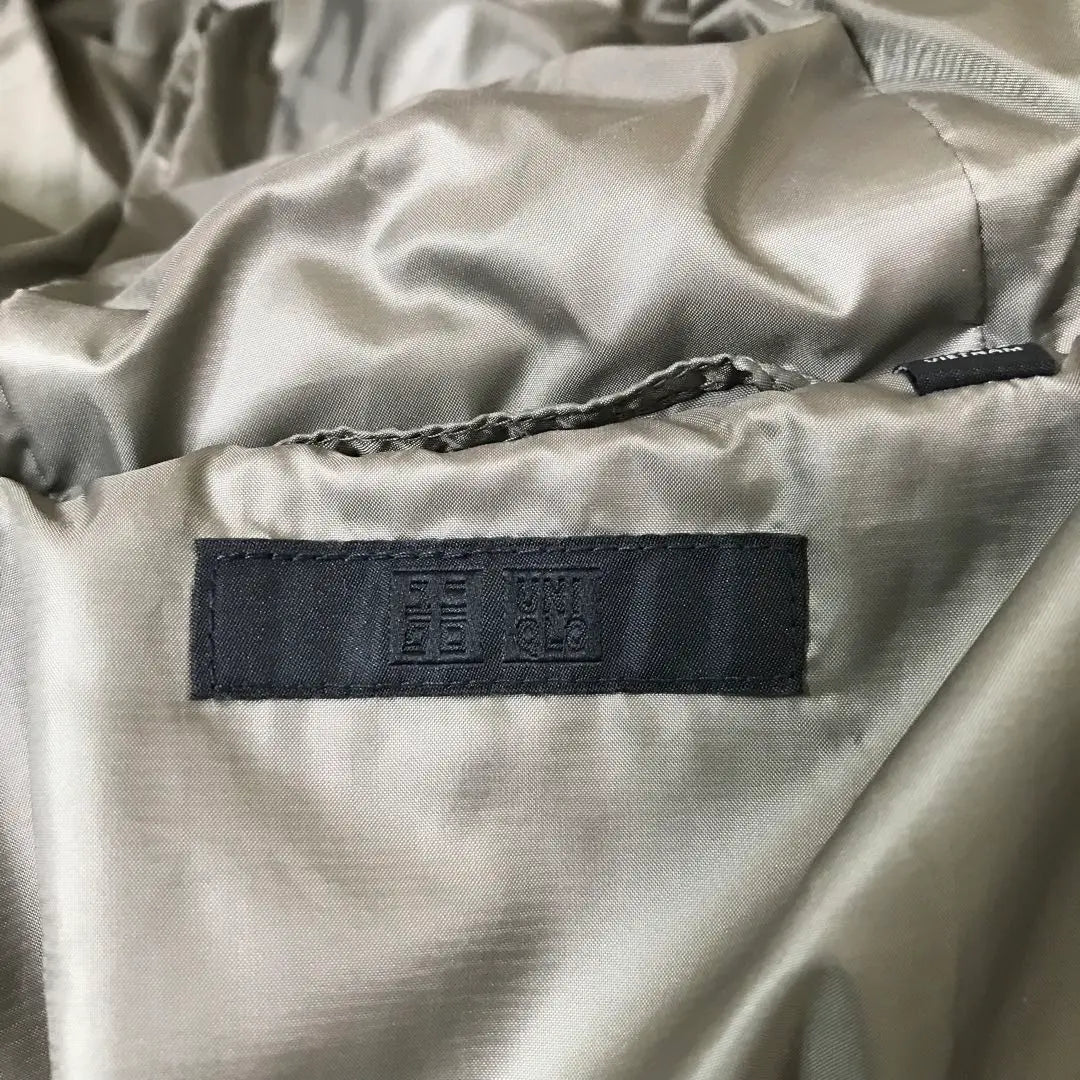 Chaqueta de plumón de nailon UNIQLO nueva sin usar con etiqueta y capucha color marfil