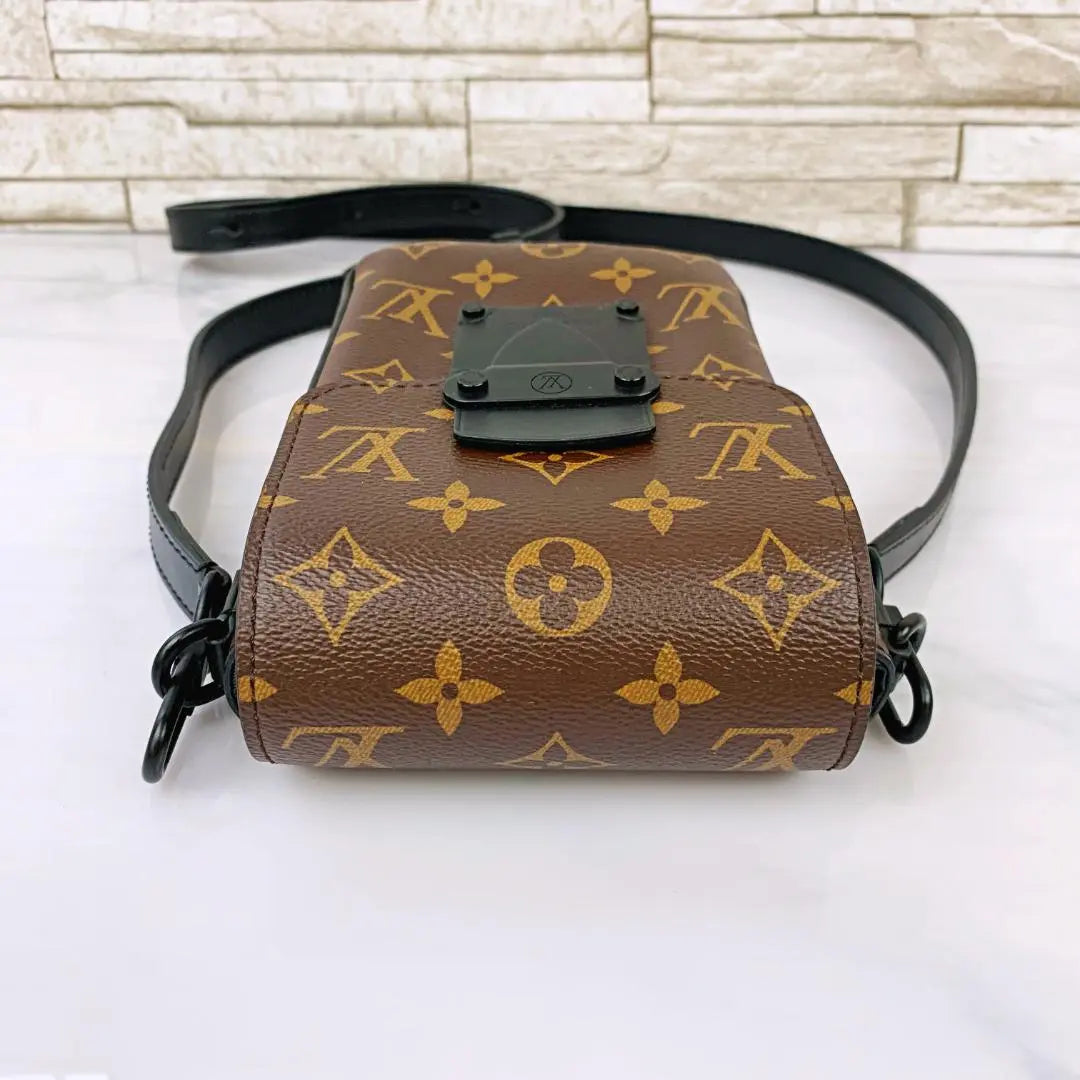 [Excelente estado] Cartera vertical portátil Louis Vuitton LV