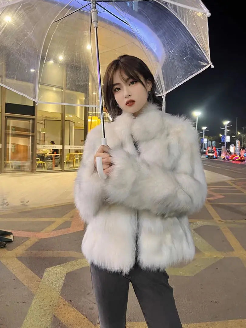 A fur coat that is fluffy and comfortable to wear and is perfect for cold seasons