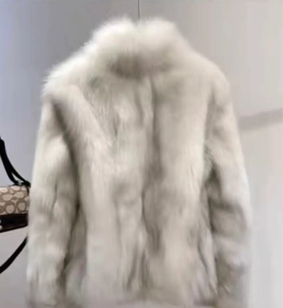 A fur coat that is fluffy and comfortable to wear and is perfect for cold seasons