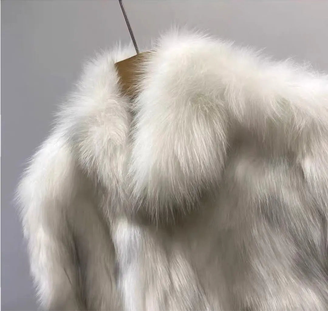 A fur coat that is fluffy and comfortable to wear and is perfect for cold seasons