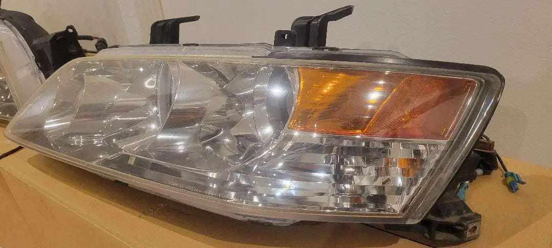 Lancer Evolution 7 8 9 US headlight inner plating