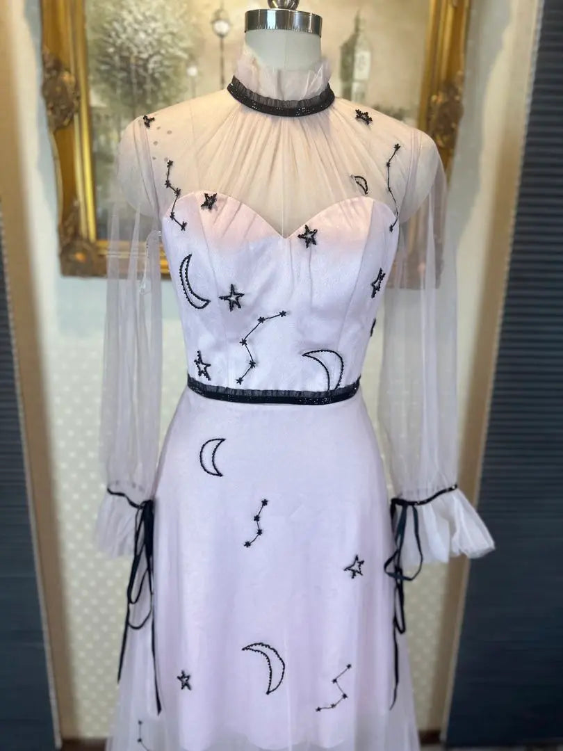 Elegant constellation embroidered party dress