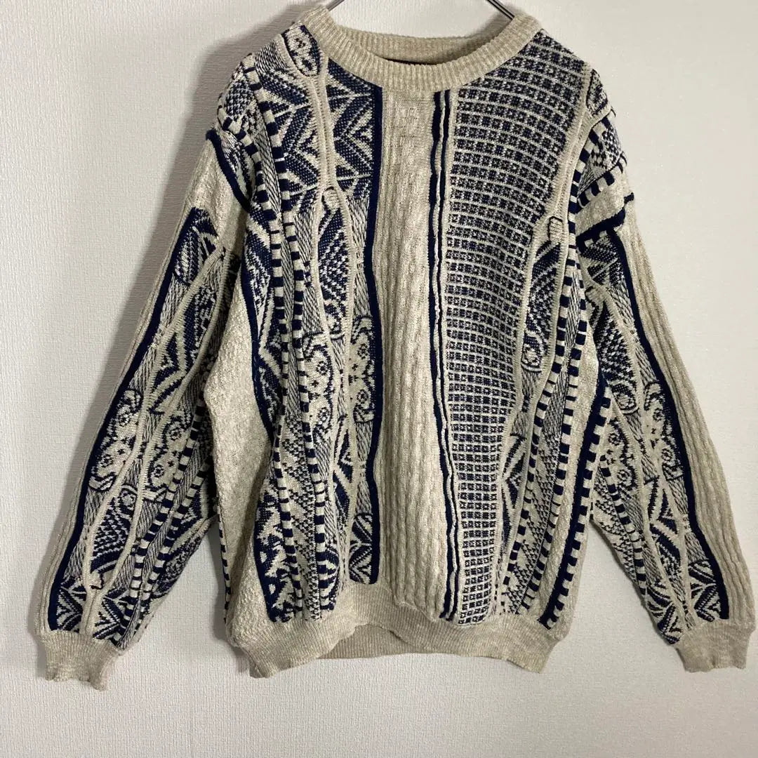 "An unusual 3D knit sweater, all-over pattern, crazy pattern, loose-dovey, white, black"