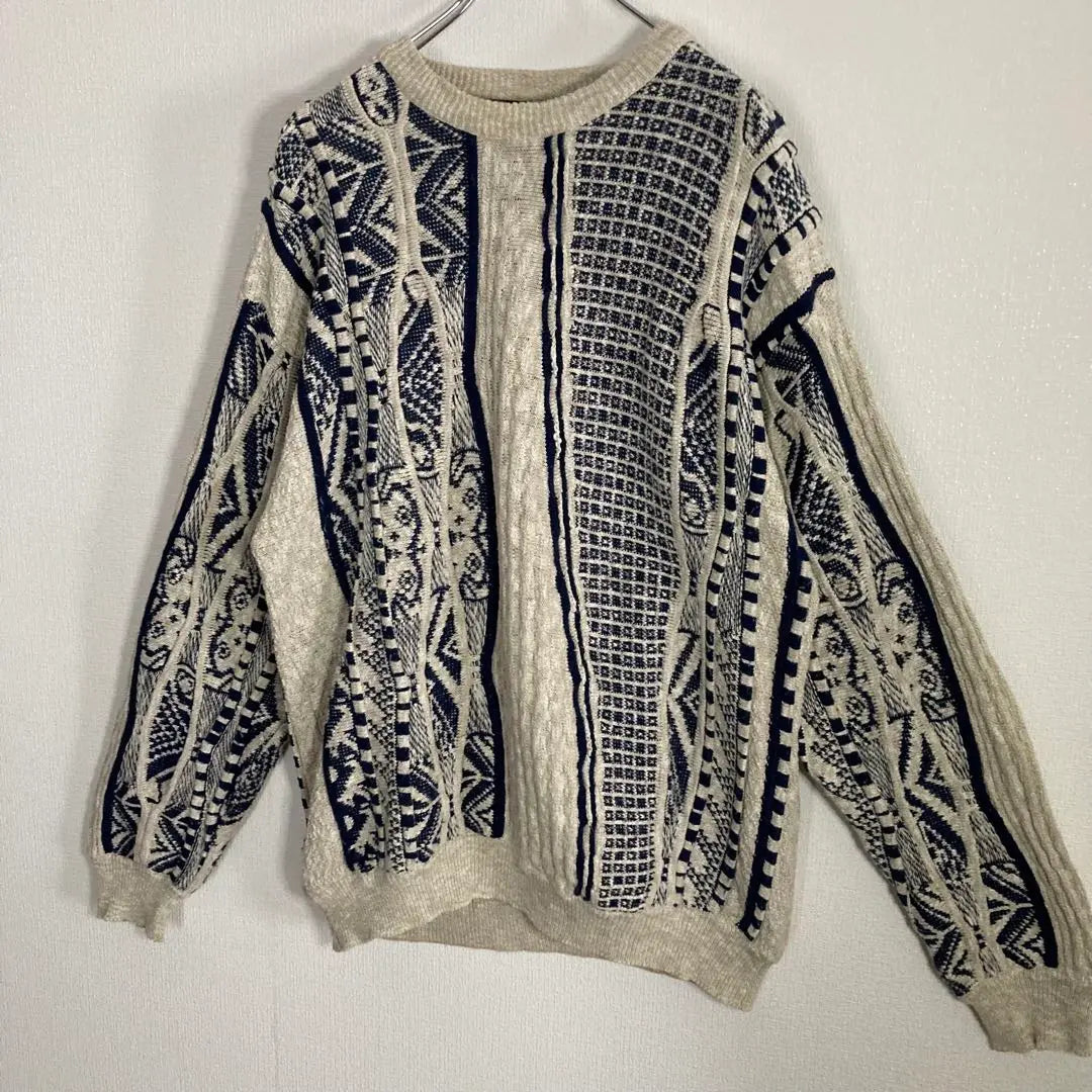 "An unusual 3D knit sweater, all-over pattern, crazy pattern, loose-dovey, white, black"