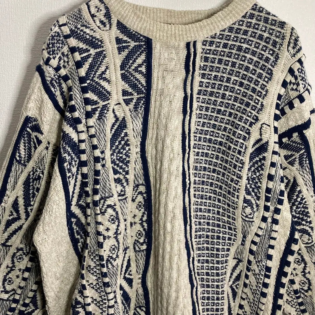 "An unusual 3D knit sweater, all-over pattern, crazy pattern, loose-dovey, white, black"