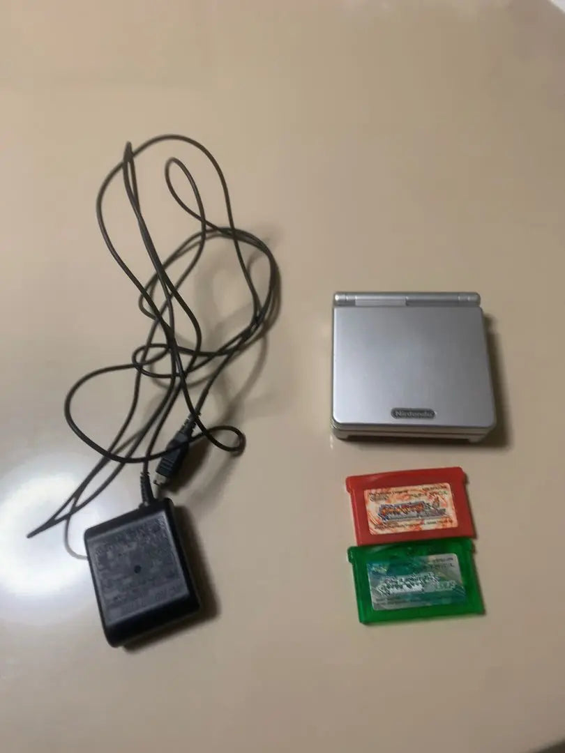 Nintendo SP body, charger, bonus