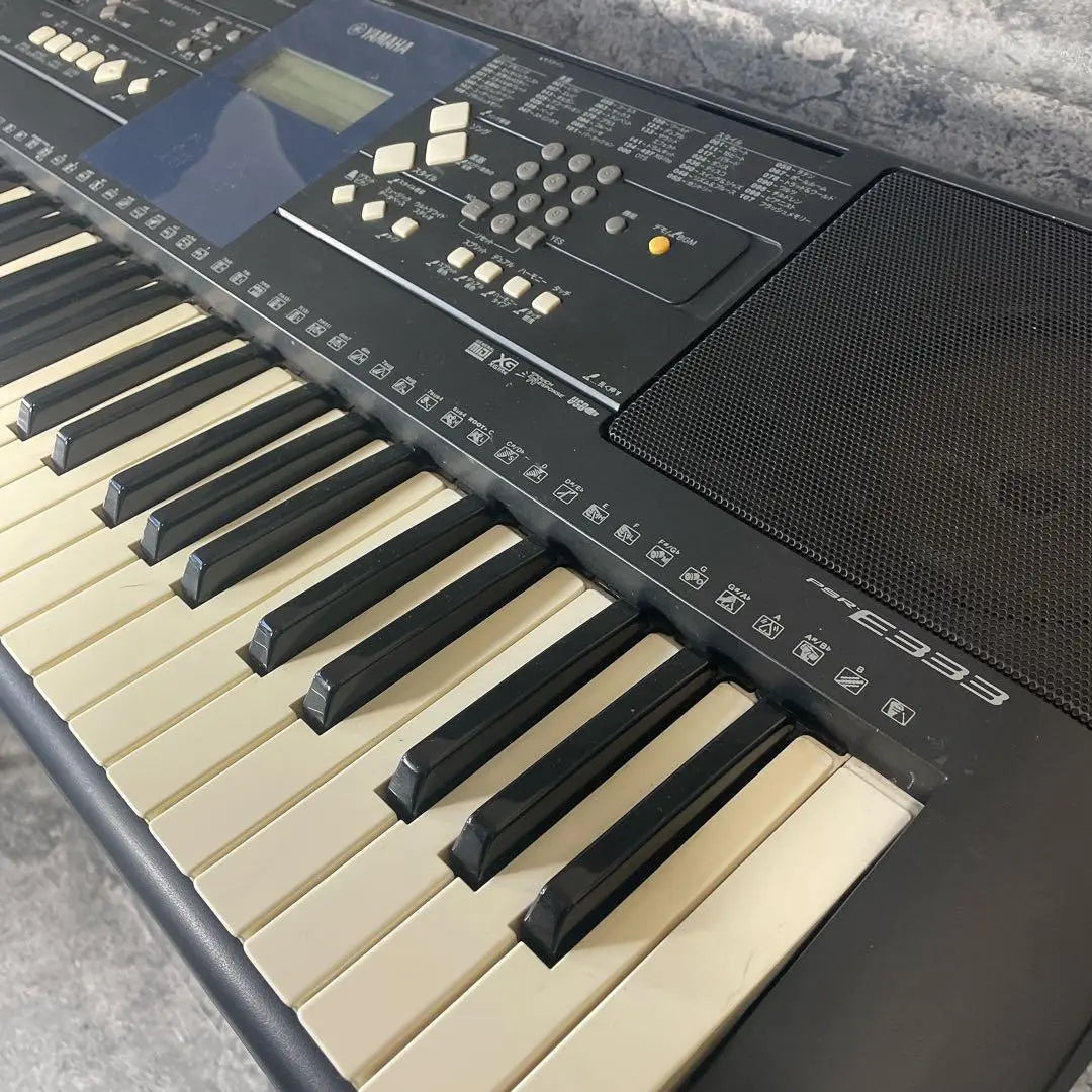 YAMAHA PSR-E333 61-key electronic keyboard with stand and storage bag